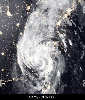 Hurricane Michael Reaches North Carolina Since making landfall, the storm has caused severe property damage and deaths in the southeastern United States, with more damage expected.  The category 4 hurricane weakened throughout Oct. 10 and was downgraded to a tropical storm by Oct. 11. The Visible Infrared Imaging Radiometer Suite (VIIRS) on the Suomi NPP satellite acquired data for the composite image below in the early morning hours of Oct. 11, as the storm passed over Georgia and South Carolina. The false-color image shows infrared signals known as brightness temperature, which helps disting Stock Photo