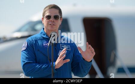 SpaceX Demo-2 Crew Arrival  NASA astronaut Robert Behnken speaks to members of the media after he and NASA astronaut Douglas Hurley arrived at the Launch and Landing Facility at NASA’s Kennedy Space Center ahead of SpaceX’s Demo-2 mission, Wednesday, May 20, 2020, in Florida. NASA’s SpaceX Demo-2 mission is the first launch with astronauts of the SpaceX Crew Dragon spacecraft and Falcon 9 rocket to the International Space Station as part of the agency’s Commercial Crew Program. The flight test will serve as an end-to-end demonstration of SpaceX’s crew transportation system. Behnken and Hurley Stock Photo