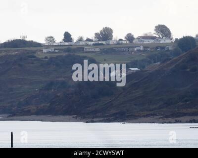 House on edge of cliff after erosion from Storm damage after North Sea ...