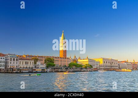 Venice cityscape with San Marco basin of Venetian lagoon water, Procuratie Vecchie, Campanile bell tower, Biblioteca Marciana Library and Doge's Palace Palazzo Ducale building, Veneto Region, Italy Stock Photo