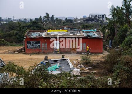 Puri, India - February 3, 2020: An unidentified man walks outside D.A.V public school on February 3, 2020 in Puri, India Stock Photo