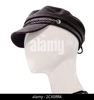 Head of a white abstract mannequin in a black cap on a white background Stock Photo