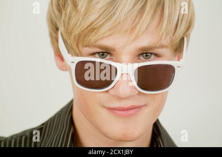 Young man wearing sunglasses. Close view. Stock Photo