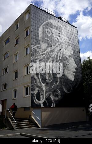 FRENCH REPUBLIC SYMBOL MARIANNE  PAINTED ON A WALL OF SUBURB BUILDING IN PERIGEUX AQUITAINE FRANCE - ART STREET - WALL FRESCO © Frederic BEAUMONT Stock Photo