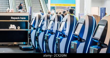 Auckland, New Zealand: Self service Mobile kiosk for check-in to New Zealand Airlines at Auckland International Airport, boarding pass and baggage tag Stock Photo