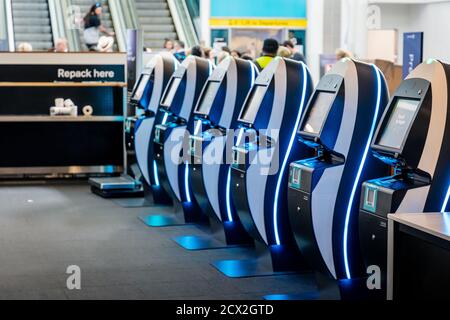 Auckland, New Zealand: Self service Mobile kiosk for check-in to New Zealand Airlines at Auckland International Airport, boarding pass and baggage tag Stock Photo