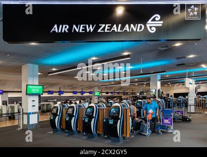 Auckland, New Zealand: Self service Mobile kiosk for check-in to New Zealand Airlines at Auckland International Airport, boarding pass and baggage tag Stock Photo