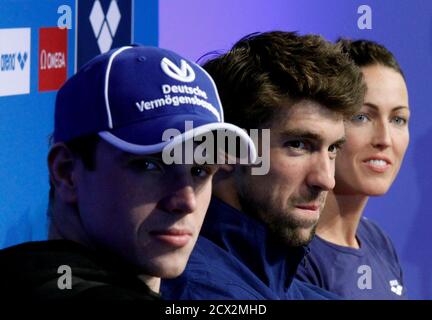 Swimmers L R Paul Biedermann Of Germany Michael Phelps Of The U S And Therese Alshammar Of Sweden