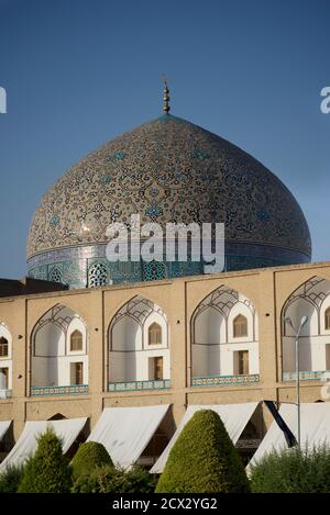 The Lotfollah Mosque and bazaar buildings in front. Imam Square. also known as Naqsh-e Jahan Square. Isfahan, Iran Stock Photo