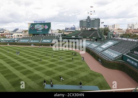 Chicago, United States. 30th Sep, 2020. Miami Marlins players warming up before the NL Wild Card Game against the Chicago Cubs at Wrigley Field on Wednesday, September 30, 2020 in Chicago. Photo by Kamil Krzaczynski/UPI Credit: UPI/Alamy Live News Stock Photo