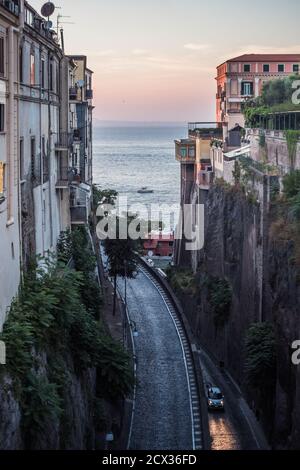 Via Luigi de Maio Street in Sorrento on the Sorrentine Coast in the Evening between the Cliffs with View of the Sea Stock Photo