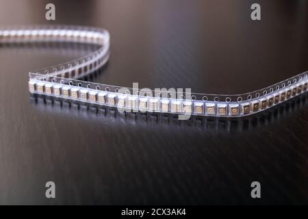 LED strip on a wooden table closeup Stock Photo