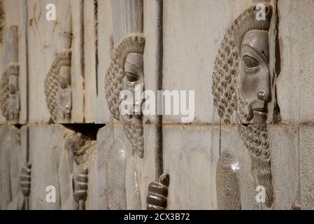 Apadana palace ruins and bas reliefs, Persepolis, Iran. Achaemenid soldiers Stock Photo