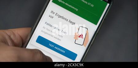 Corona warning app on a smartphone displays the test result - Incorrect - German words on the picture Stock Photo