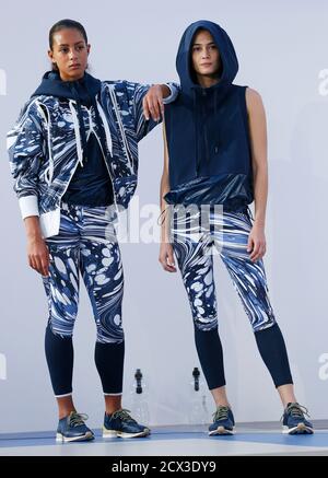 teksten Compatibel met Economie Models present creations from the Adidas by Stella McCartney Spring/Summer  2014 collection during London Fashion Week September 17, 2013.  REUTERS/Suzanne Plunkett (BRITAIN - Tags: FASHION SPORT Stock Photo - Alamy