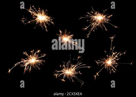 Multiple Christmas Wedding or Birthday Sparklers on a Black Background Stock Photo