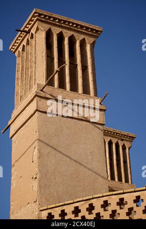 A windtower or wind catcher. A traditional Persian architectural element to create natural ventilation in buildings. Yazd, Iran Stock Photo