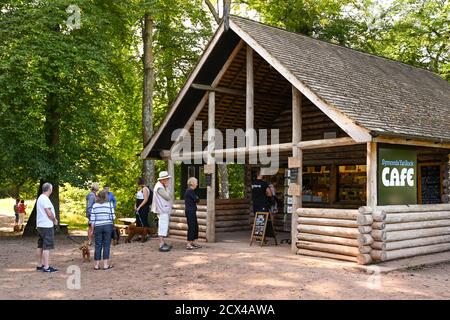 Symonds, Yat, England - September 2020:  People queuing at the cafe at the Symonds Yat Rock lookout point. It is constructed of logs. Stock Photo