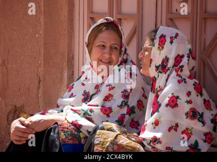 Local Abyanaki women in local style dress. Abyaneh village, Barzrud Rural District, Isfahan Province, Iran Stock Photo