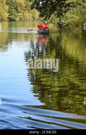 Symonds, Yat, England - September 2020:  Two people in a canoe on the River Wye in Symonds Yat. Stock Photo