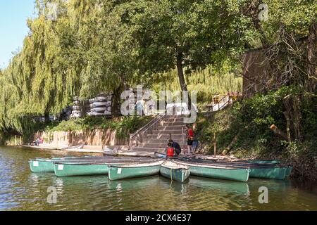 Symonds, Yat, England - September 2020:  Two people about to get in a canoe to paddle on the River Wye in Symonds Yat. Stock Photo