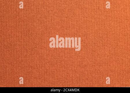 Red laid textured paper cardboard background close up macro Stock Photo