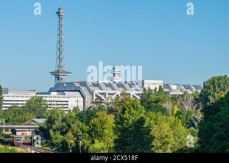 Berlin radio tower with ICC and a moving S-Bahn in landscape format Stock Photo