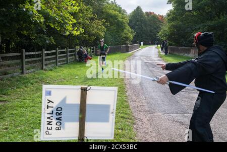 Professional male athlete, George Goodwin wins the last event of the year at the Thoresby Park X Outlaw triathlon. Stock Photo