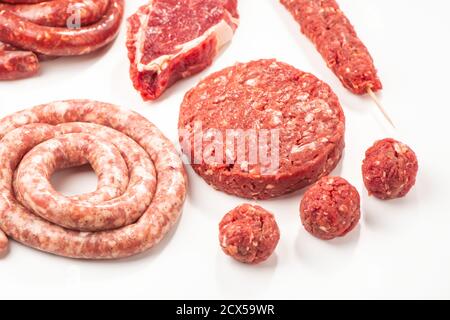 Assortment of semi-finished meat products on white background Stock Photo