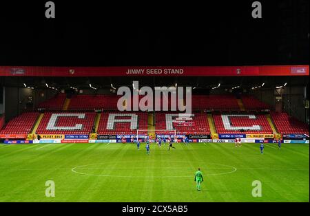 A general view of play in front of the empty Jimmy Seed stand during the EFL Trophy match at The Valley, London. Stock Photo