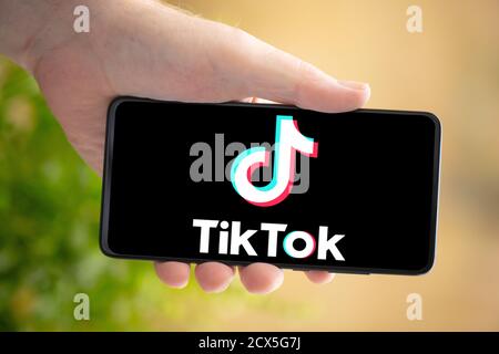 WETZLAR, GERMANY 2020-08-26 In this photo illustration an TIKTOK Logo seen displayed on a smartphone. Stock Photo