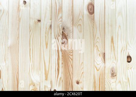 Structure wooden plank light brown background with vertical boards. Flat lay close-up view. Stock Photo