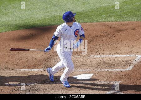 Chicago, United States. 30th Sep, 2020. Chicago Cubs' Ian Happ (8) hits a solo home run against the Miami Marlins in the fifth inning of the NL Wild Card Game at Wrigley Field on Wednesday, September 30, 2020 in Chicago. Photo by Kamil Krzaczynski/UPI Credit: UPI/Alamy Live News Stock Photo