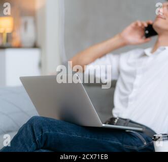 close up. young entrepreneur is talking on a smartphone. Stock Photo