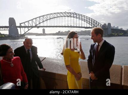 Britain's Prince William and his wife Catherine, the Duchess of Cambridge, are pictured in front of the Sydney Harbour Bridge during a reception at the Sydney Opera House, April 16, 2014. Pictured at left are Governor of New South Wales Marie Bashir and her husband Nicholas Shehadie. Britain's Prince William and his wife Kate are undertaking a 19-day official visit to New Zealand and Australia with their son George. REUTERS/Jason Reed (AUSTRALIA - Tags: ROYALS ENTERTAINMENT POLITICS TPX IMAGES OF THE DAY)