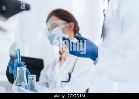 close up. female scientist discussing what about with her colleague. Stock Photo