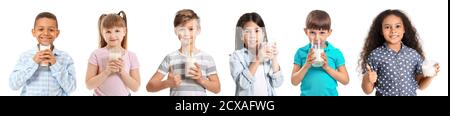 Different little children with milk on white background Stock Photo