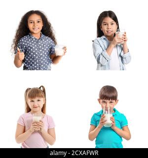 Different little children with milk on white background Stock Photo