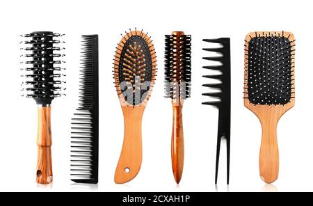 Hair brushes and combs on white background Stock Photo