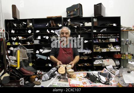Cobbler shop in Greece Stock Photo - Alamy