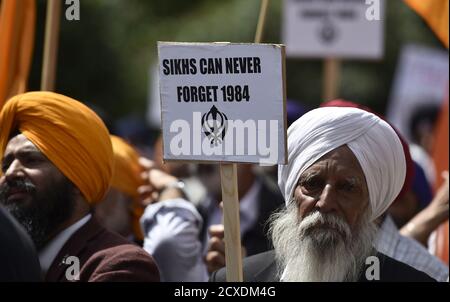 British Sikhs take part in a march and rally in central London June 7, 2015. On the 31st anniversary of the killing of Sikhs during riots in India in 1984, the campaigners were highlighting what they say is continued repression and suppression of the Sikh religion and identity in India.  REUTERS/Toby Melville
