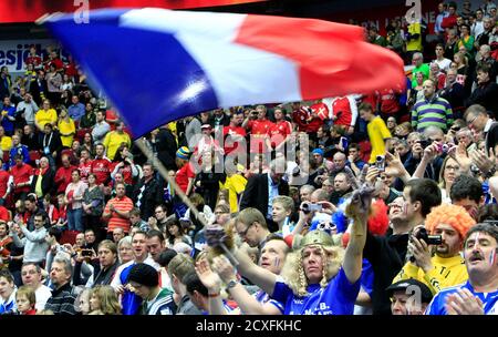 France's fans cheer before the start of the final match against Denmark during their Men's Handball World Championship in Malmo January 30, 2011. REUTERS/Radu Sigheti (SWEDEN - SPORT HANDBALL)