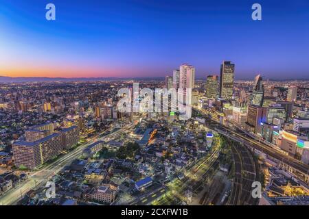 Nagoya Japan, night city skyline at Nagoya railway station and business center Stock Photo