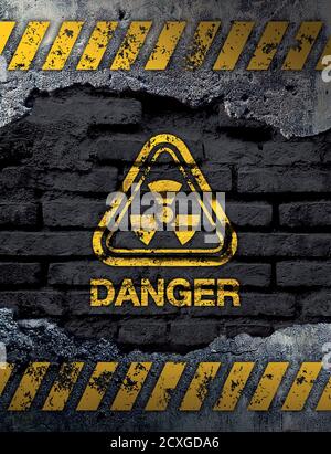 Danger sign on old brick wall background Stock Photo