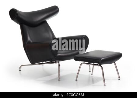 Stylish black leather sofa on white background Stock Photo