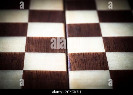 A fragment of a handmade lacquered chessboard. Stock Photo