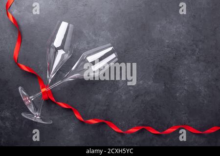 Champagne glasses on black stone background Copy space Top view Stock Photo