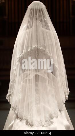 The Wedding Dress Of Britain S Catherine Duchess Of Cambridge Is Seen As It Is Prepared For Display At Buckingham Palace In London July 11 Buckingham Palace Expects Record Crowds This Summer