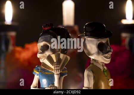 Closeup shot of two skeleton figurines for an offering of the day of the dead Stock Photo