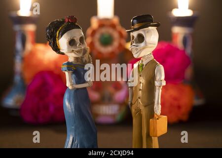 Closeup shot of two skeleton figurines for an offering of the day of the dead Stock Photo